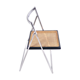 Vintage folding chair in chrome and cannage 1970