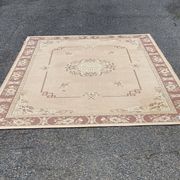 Persian rug in beige wool with woven flowers 290x190cm