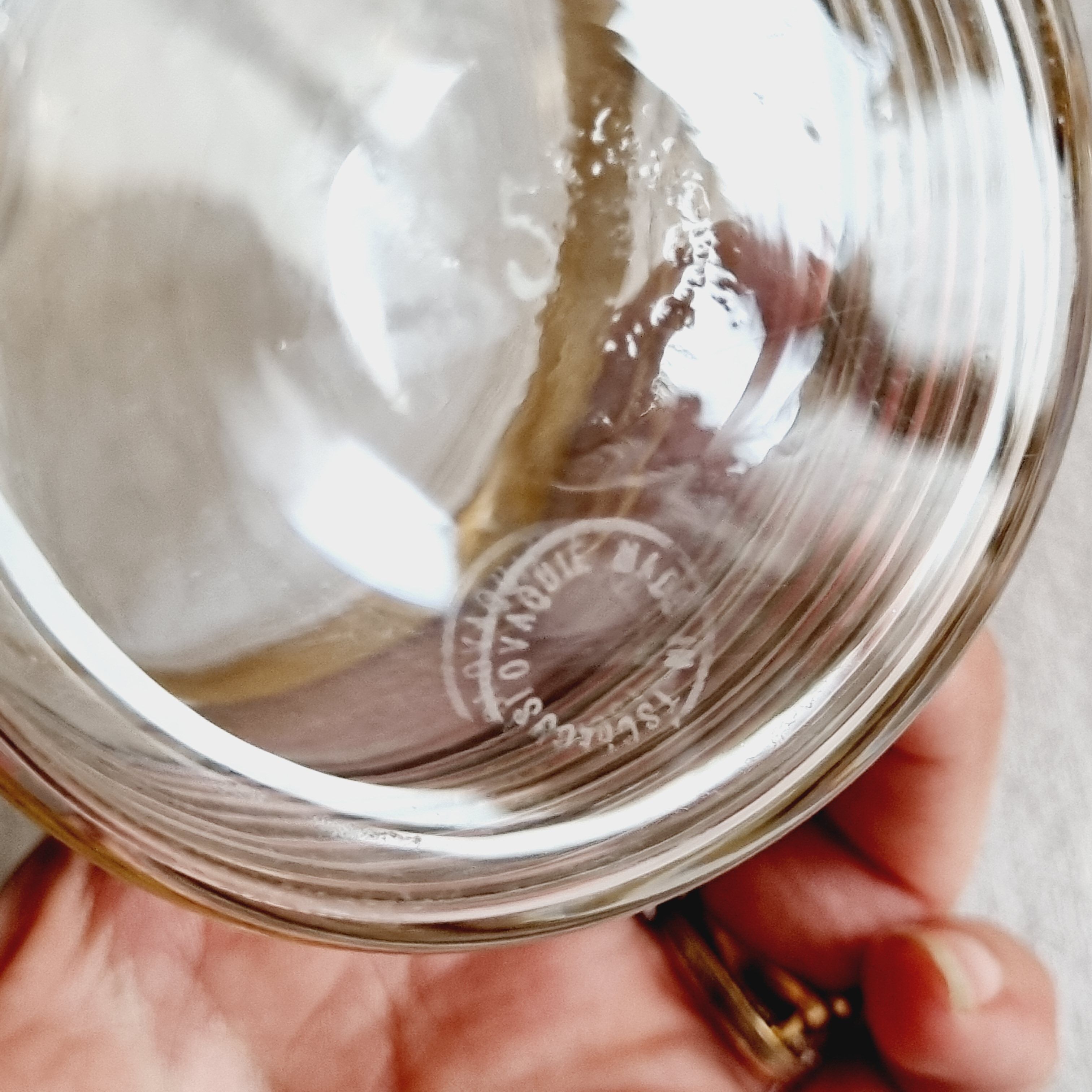 Blown glass decanter with golden borders