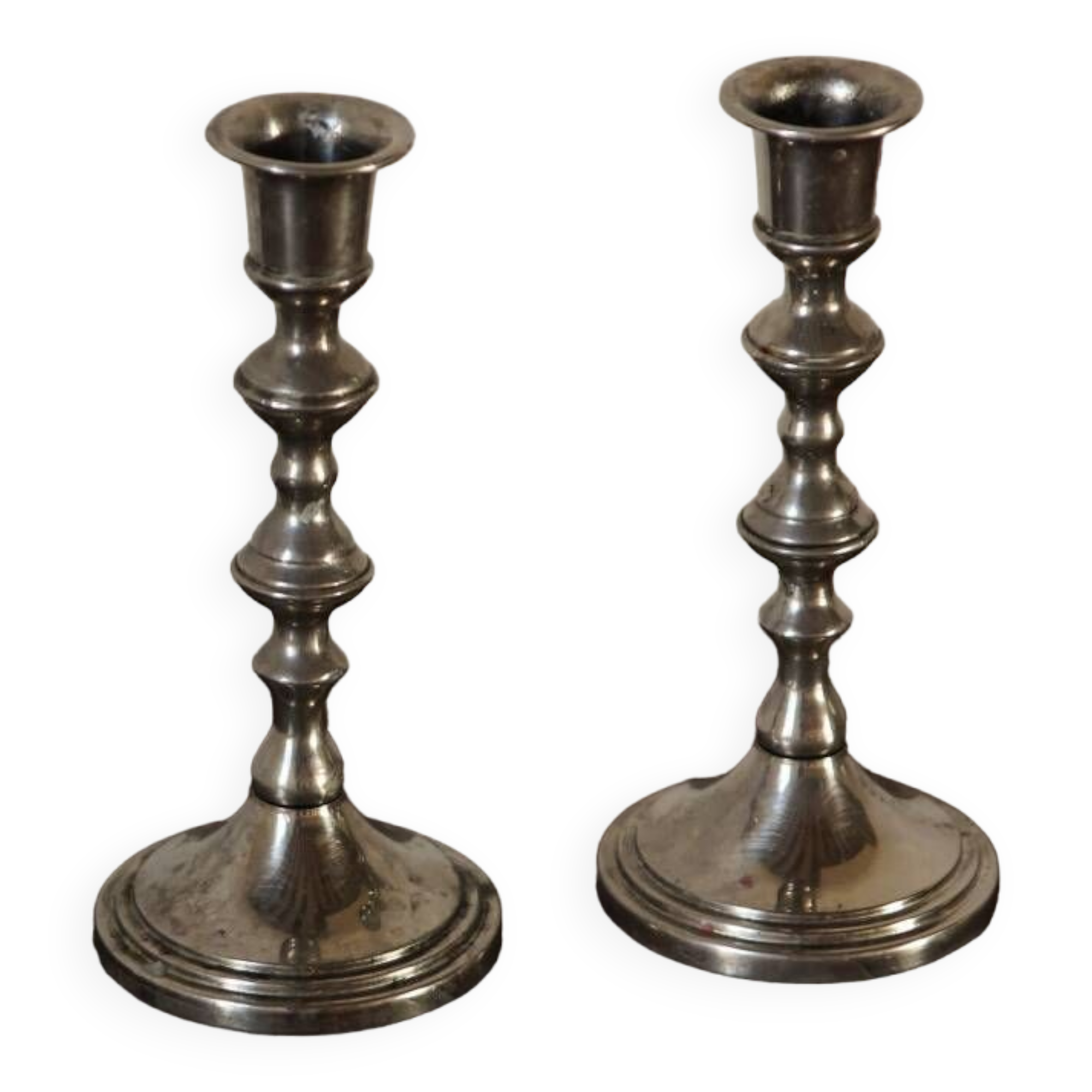 Pair of silver metal candlesticks