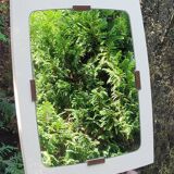 Beige and brown plastic mirror from the 70s