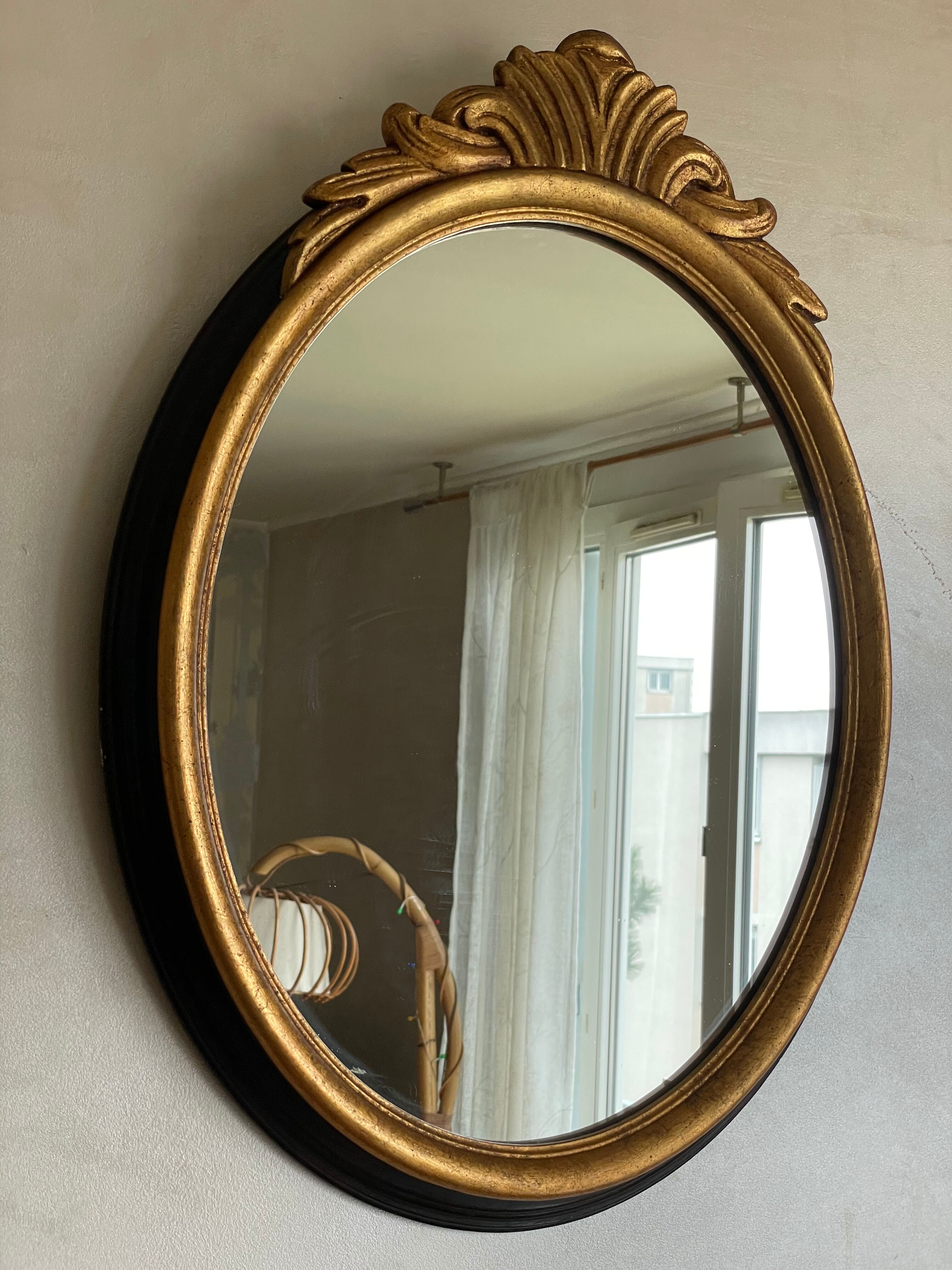 Oval mirror black and gold wood 65x50cm