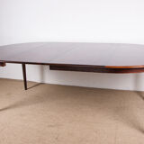 Danish extendable dining table in Rio Rosewood model 55 by Arne Vodder for Sibast 1958.