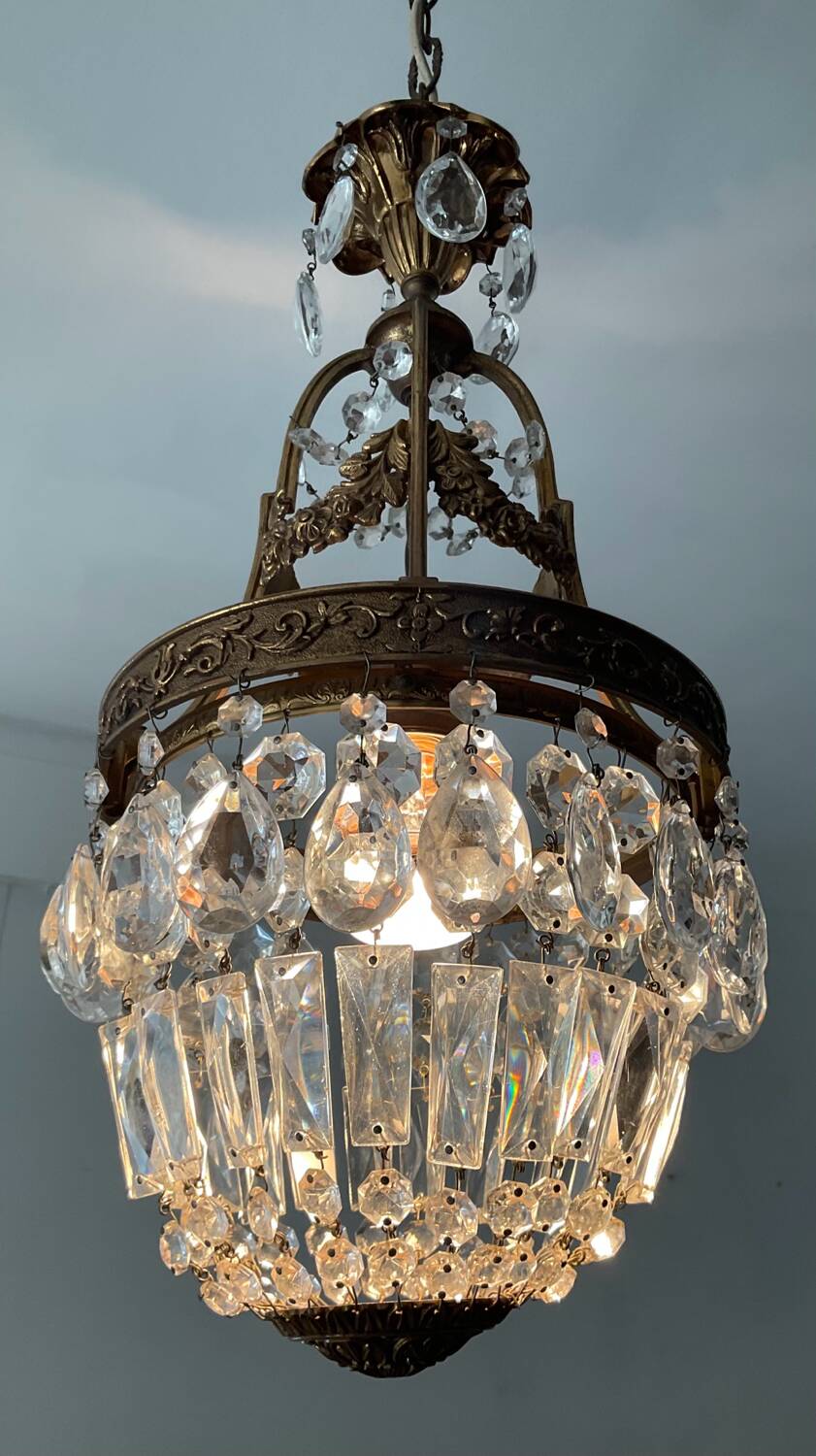 Old bronze basket chandelier with tassels
