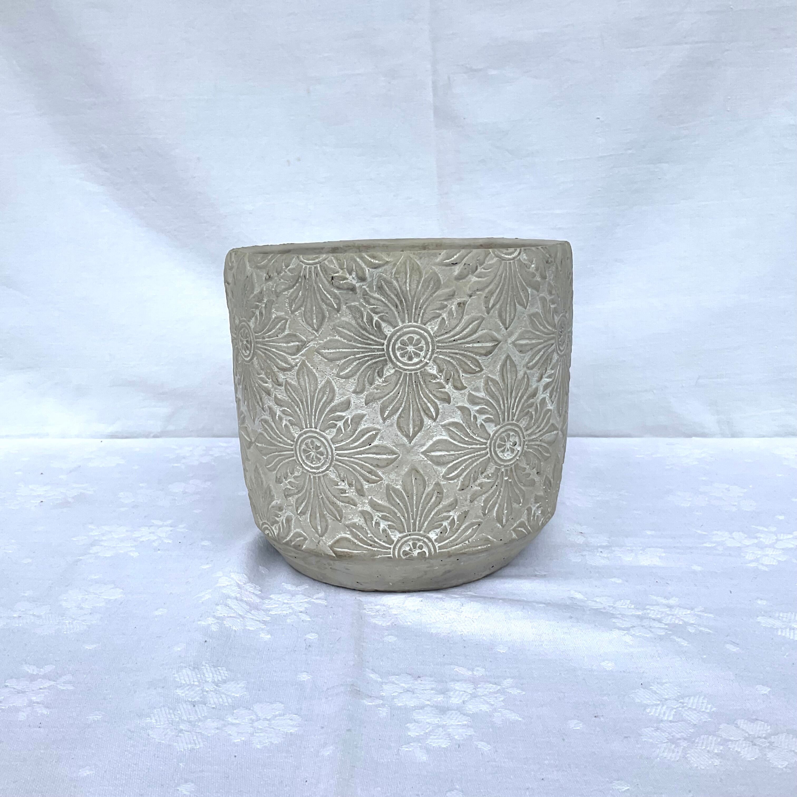 Cache-pot gray decoration in relief