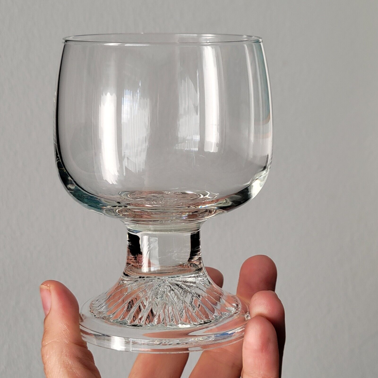 10 vintage stemmed glasses in molded glass