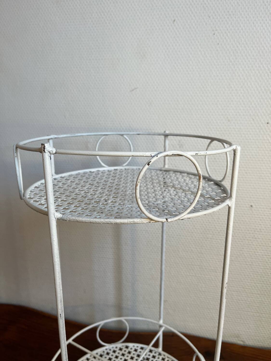 White perforated metal side table