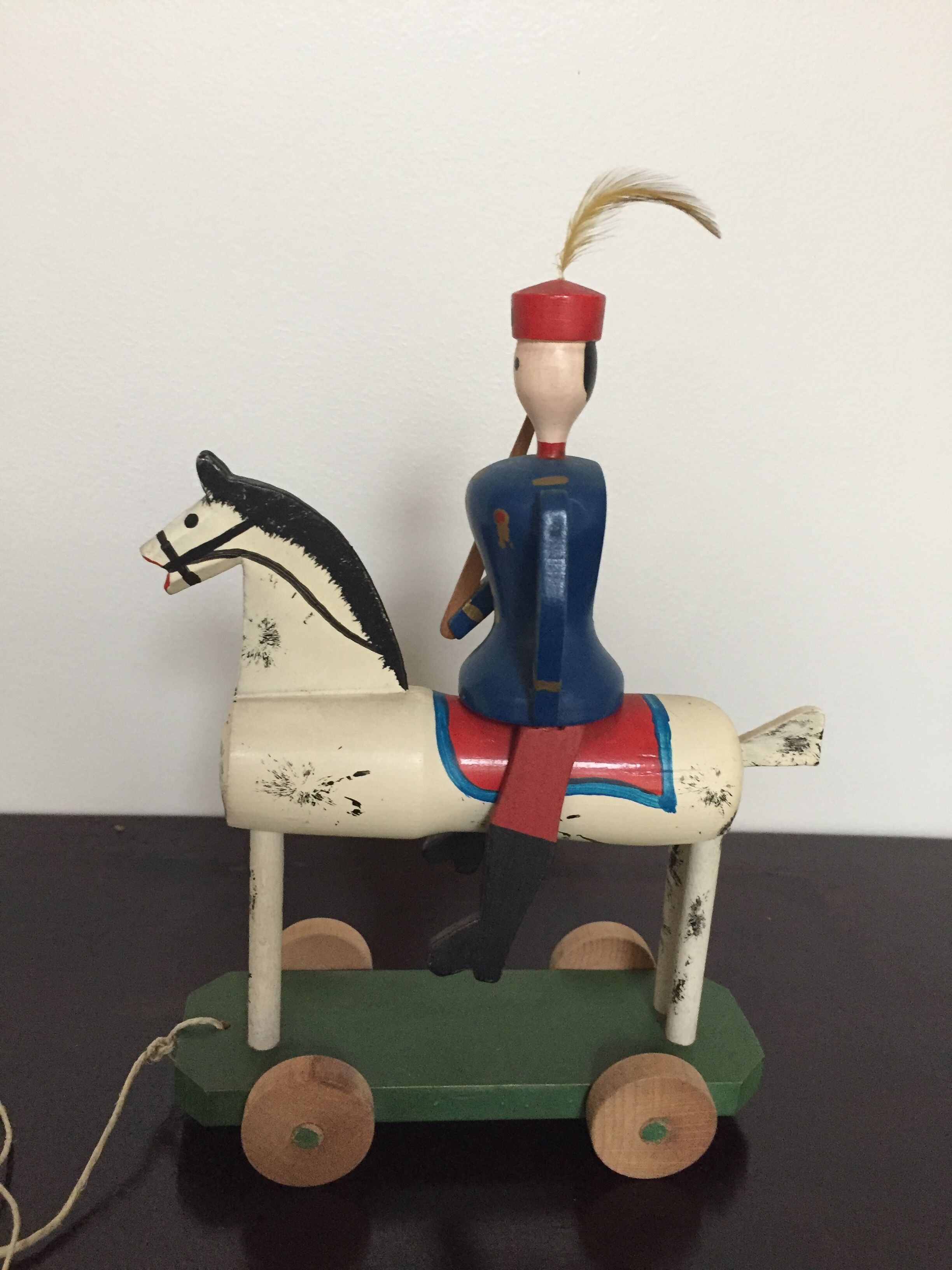 Soldier on wooden horse to shoot