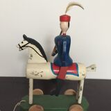 Soldier on wooden horse to shoot