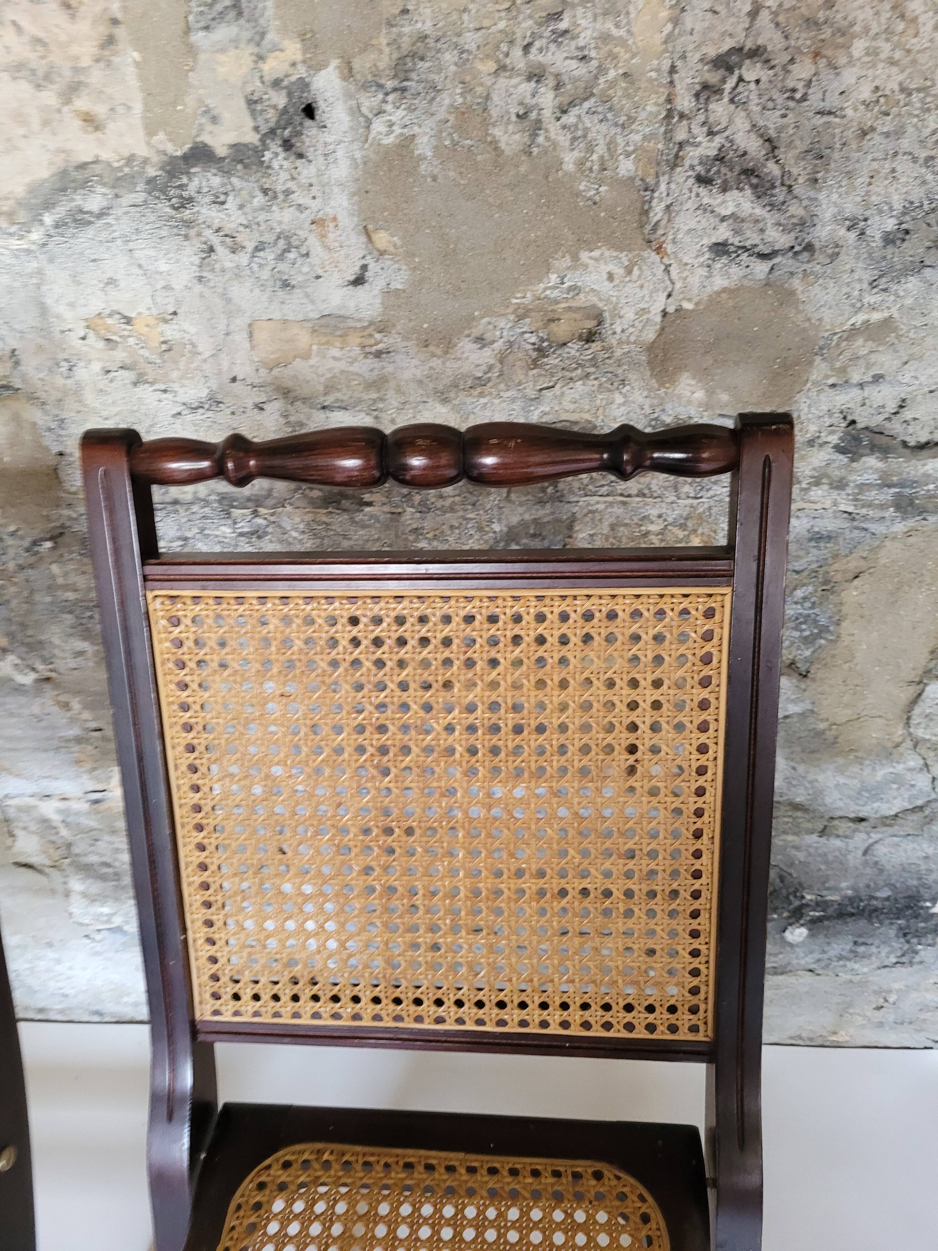 Pair of folding cane chairs