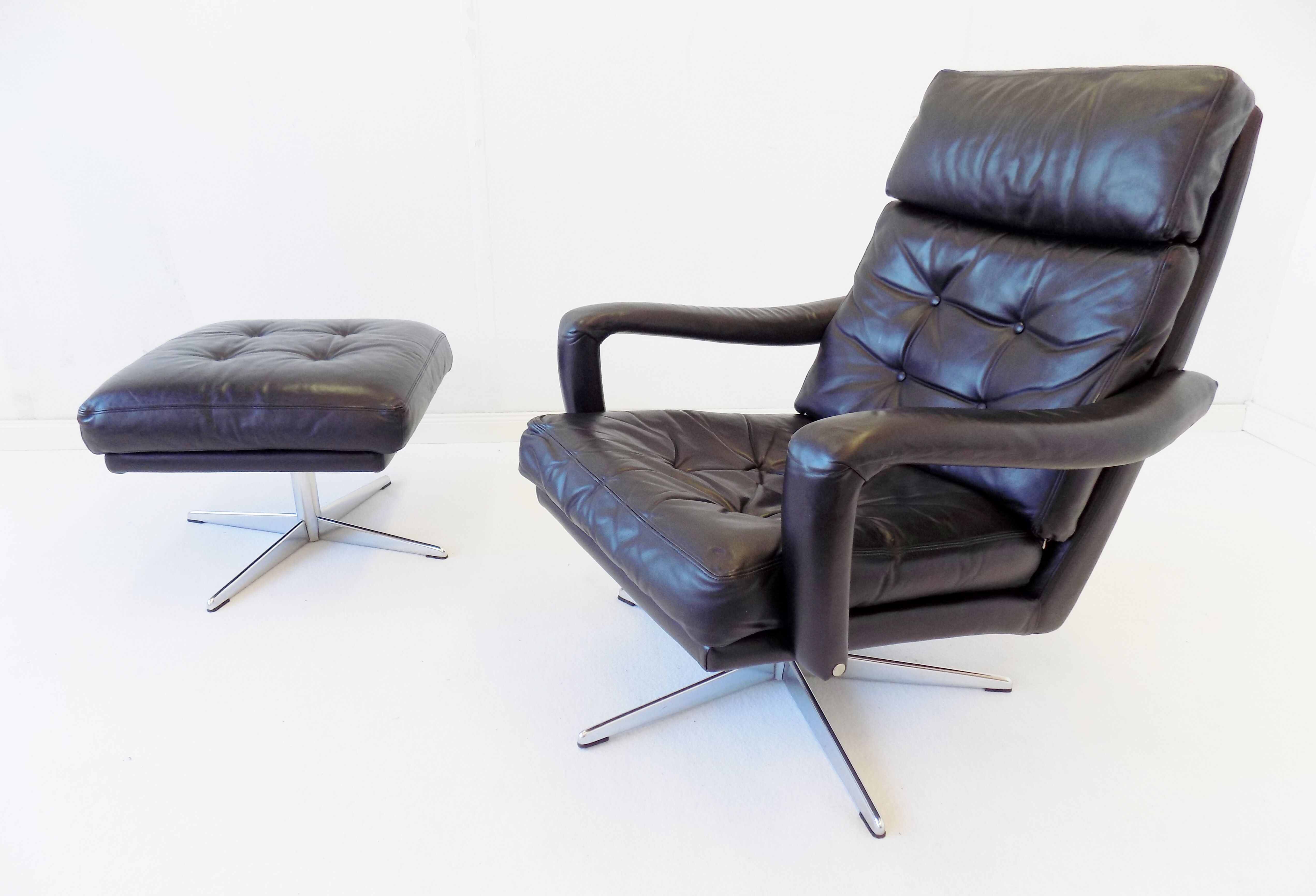 Danish black leather armchair with ottoman 70s
