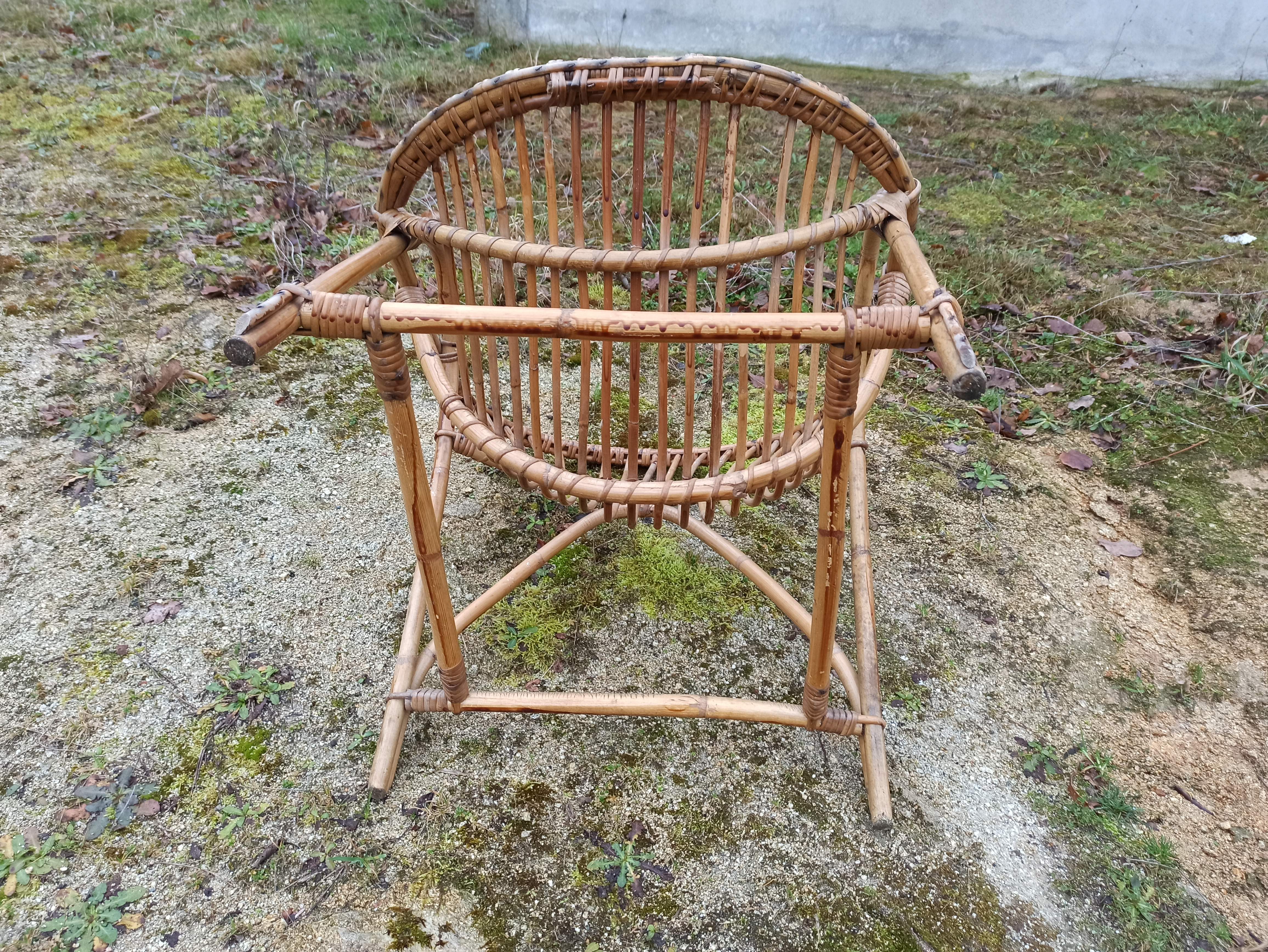 Rattan armchair with armrest
