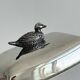 Antique shiny metal butter dish