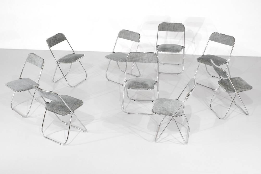 Set of 9 chrome folding chairs with fabric from the 1970s.