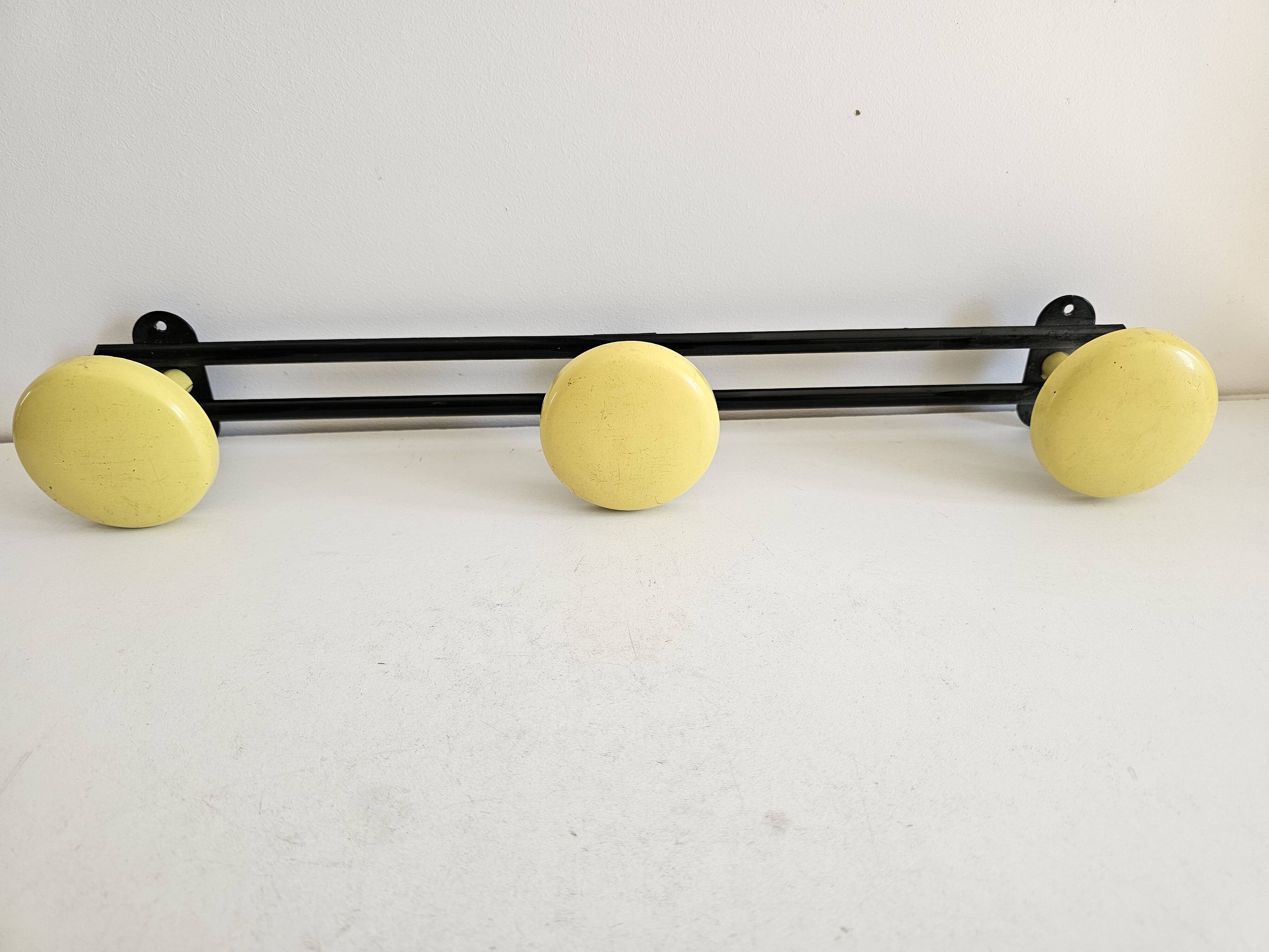 Black and yellow metal wall coat rack (3 hooks)