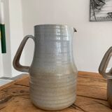 Pair vintage enamelled ceramic pitchers