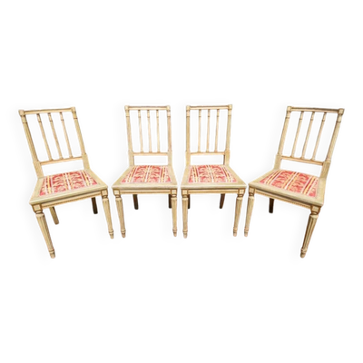 Série de 4 chaises de style Louis XVI en bois laqué gris