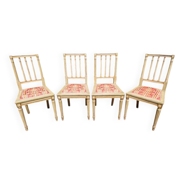 Série de 4 chaises de style Louis XVI en bois laqué gris
