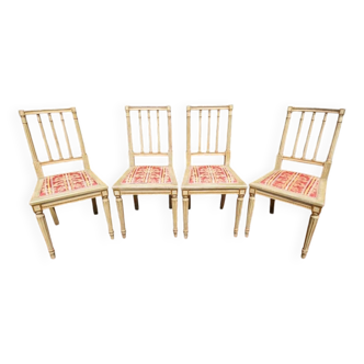 Série de 4 chaises de style Louis XVI en bois laqué gris