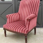 Old armchair and its Louis XVI style footrest/velvet covering