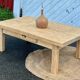 Renovated farmhouse coffee table in raw solid wood with 1 drawer.