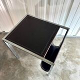 Vintage design magazine rack in chrome metal