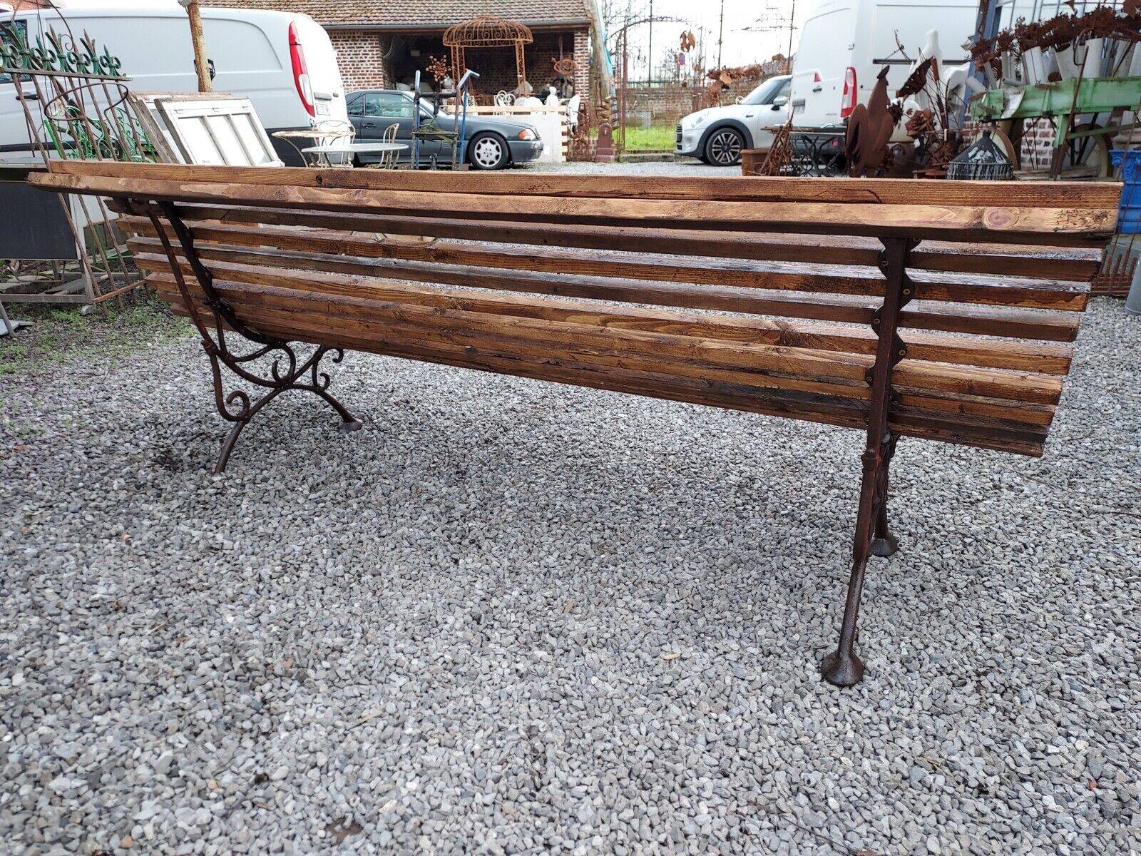 wooden garden bench with cast iron base