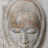 African stone face sculpture