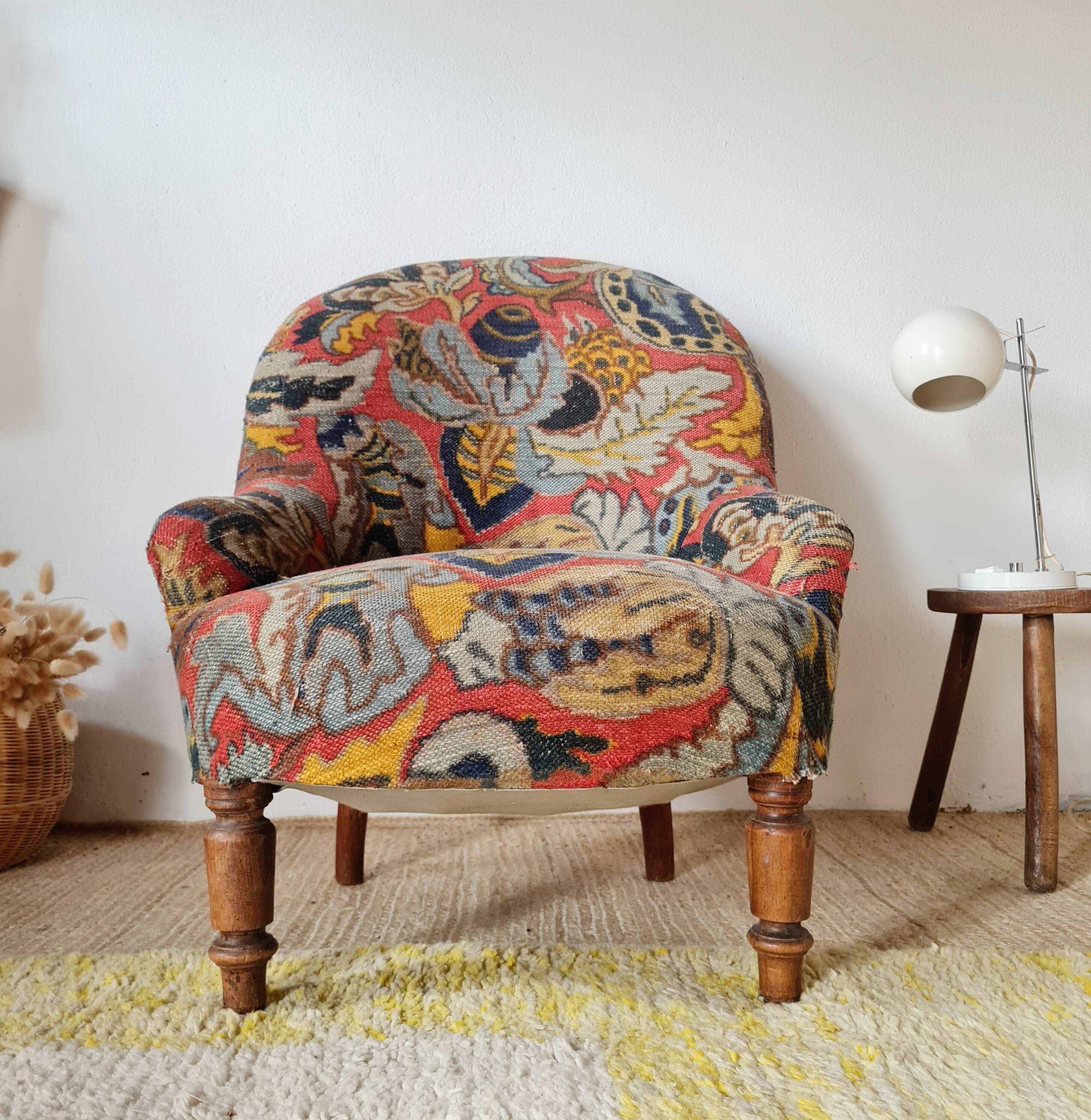Small "madame" toad chair, vintage, upholstered in multicoloured floral fabric.