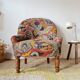 Small "madame" toad chair, vintage, upholstered in multicoloured floral fabric.