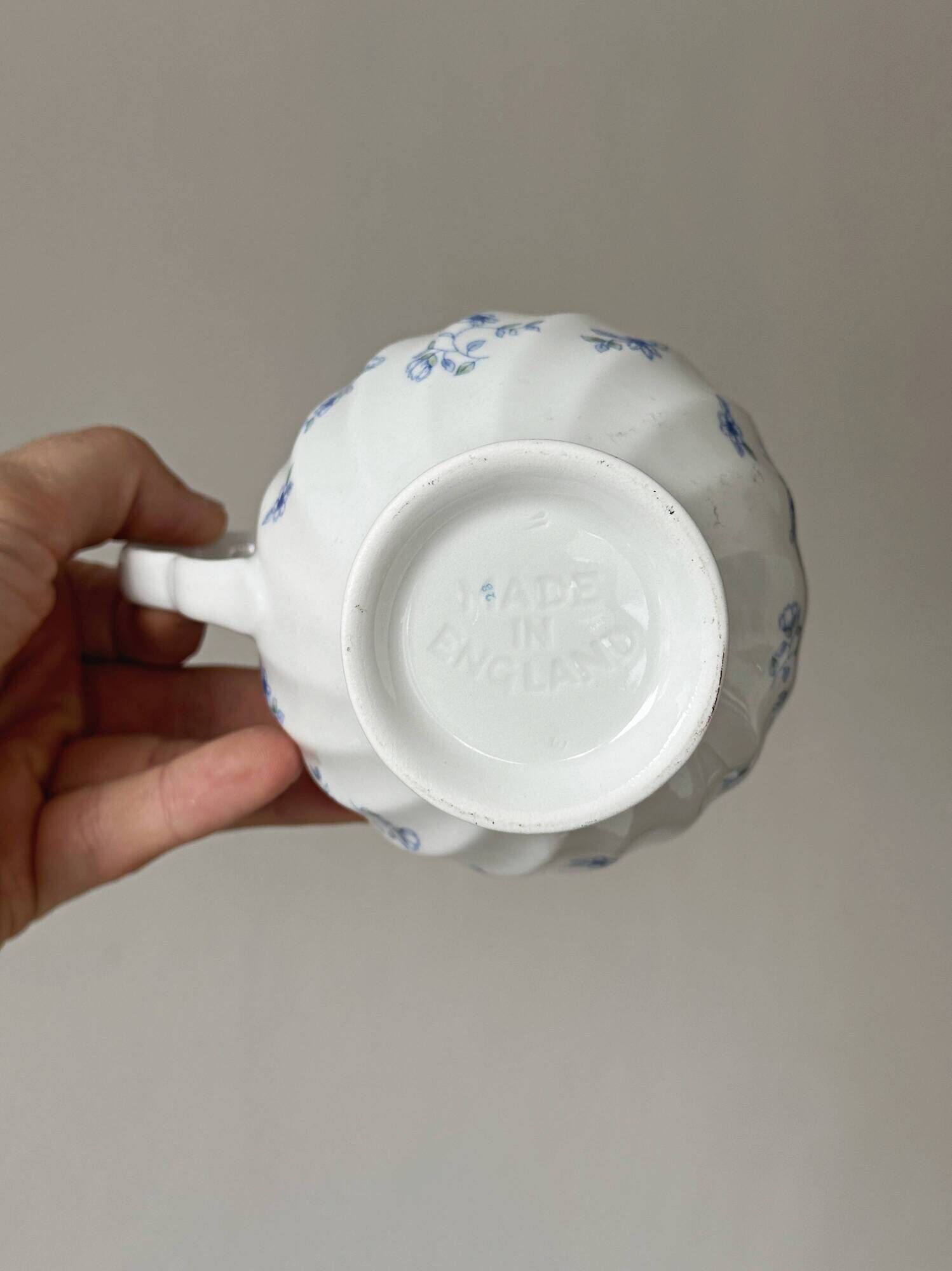 White porcelain creamer with small blue flowers – Milk jug