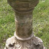 Holy water font on stone column (17th century)