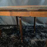 A Louis XVI period mahogany half-moon table forming a console/games table