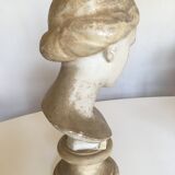 Former girl bust end 19th in plaster cast on its base