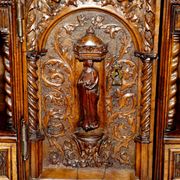18th-century carved Spanish cabinet with hidden storage.