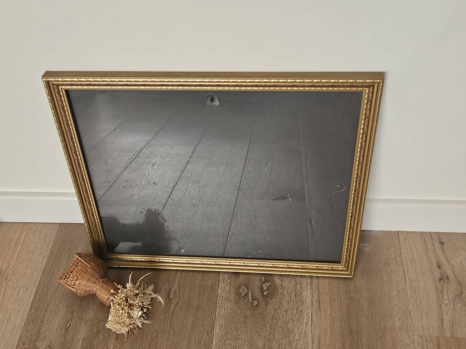 Golden frame with purple floral patterns