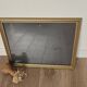 Golden frame with purple floral patterns