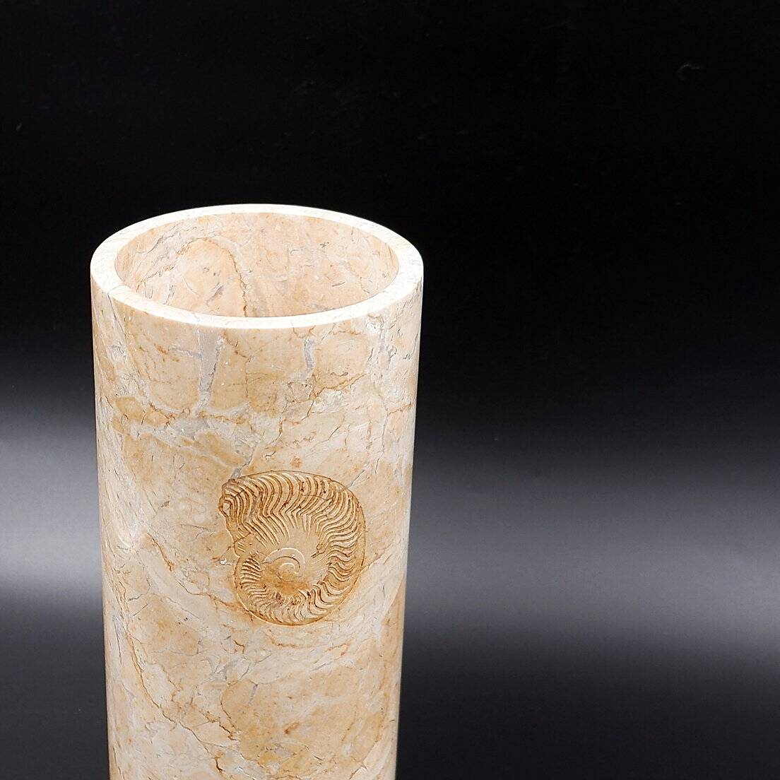 Cylindrical marble vase with fossil motif
