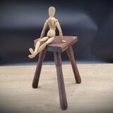 Half-round cowherd tripod stool