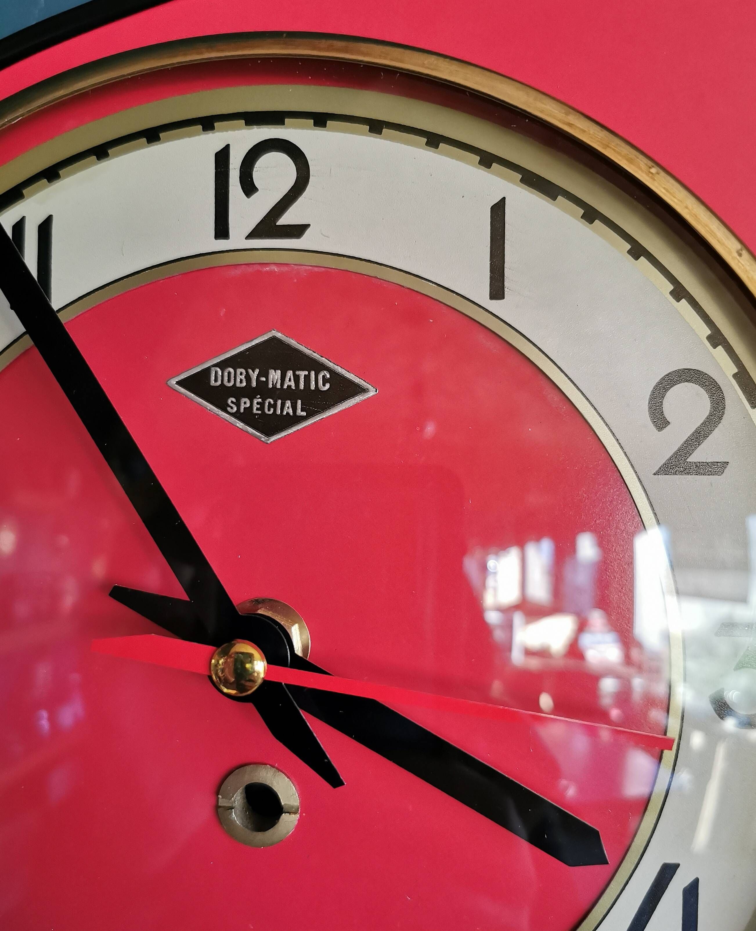Vintage formica clock silent asymmetrical wall pendulum "Doby Matic red"