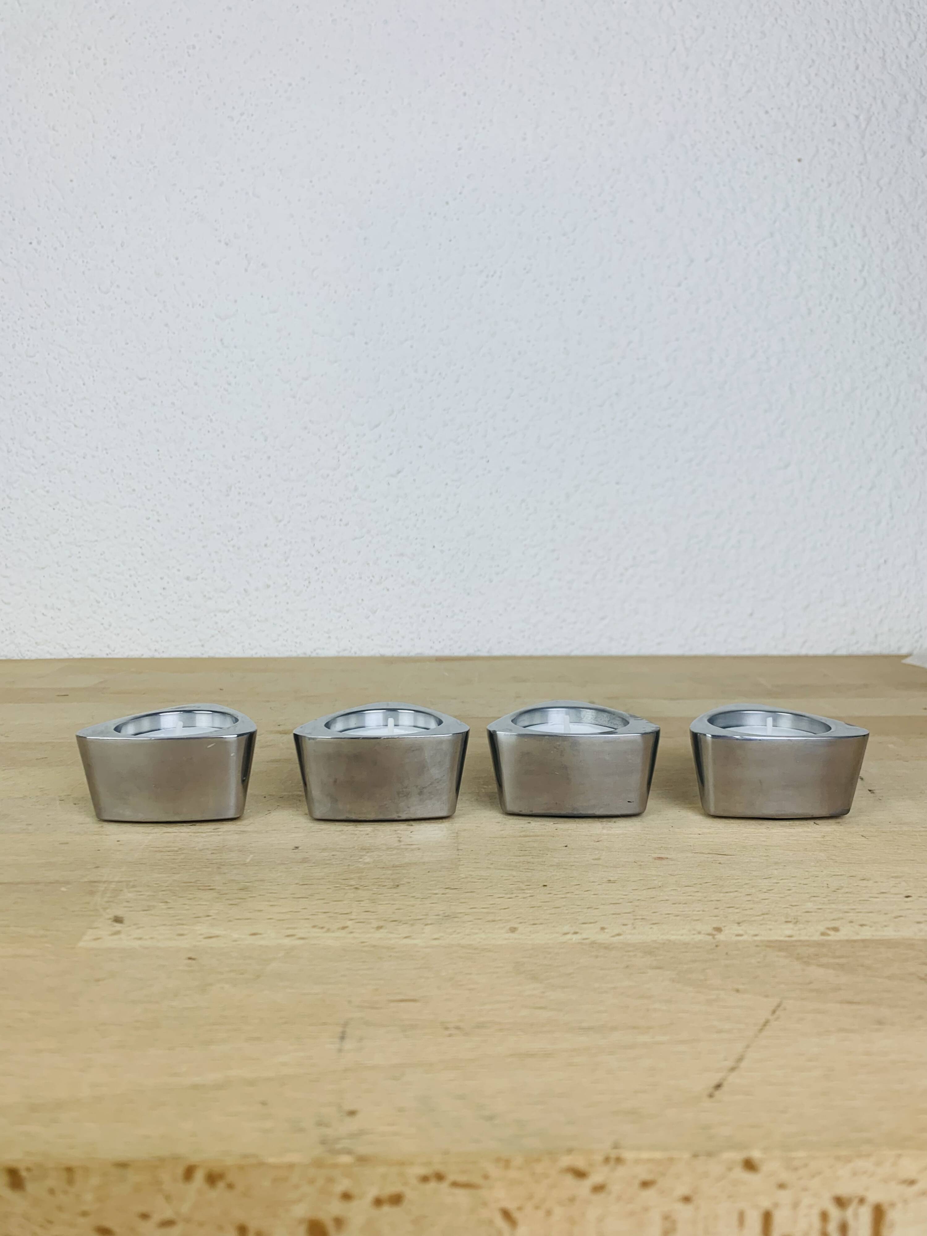 4 aluminum triangle candle holders, Ikea