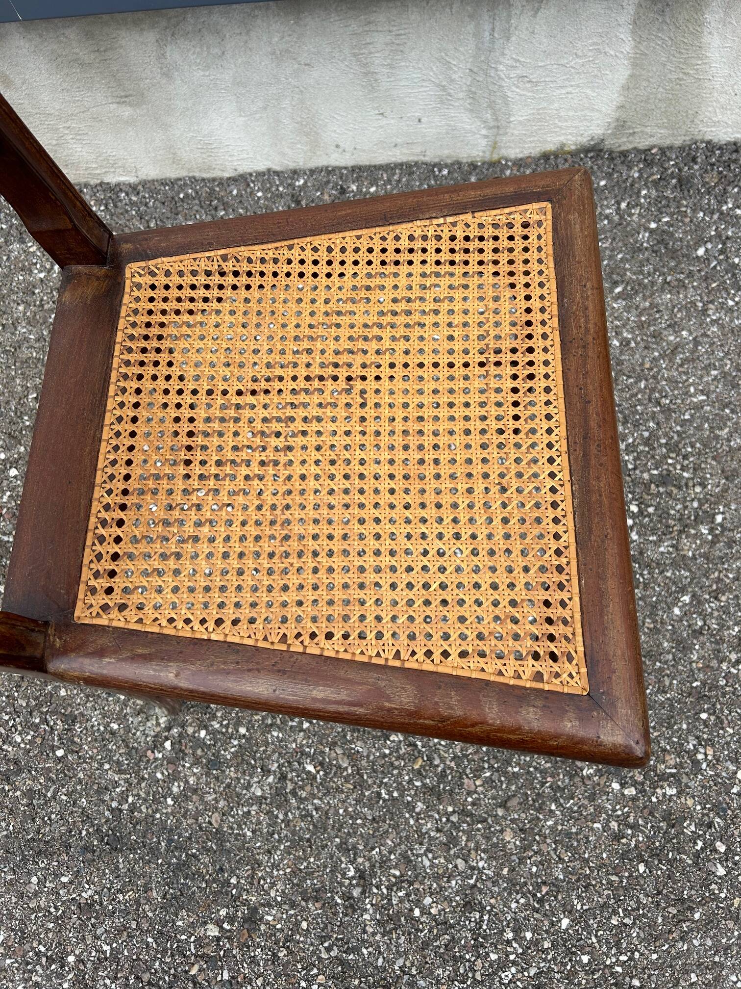 caned chair 1900