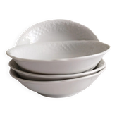 12 porcelain bowls with slip decoration and floral frieze