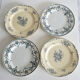 4 mismatched iron earth dessert plates