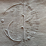 Old embroidered monogram linen sheet