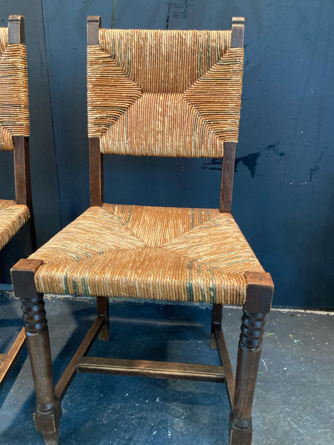 Four straw chairs