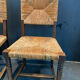 Four straw chairs