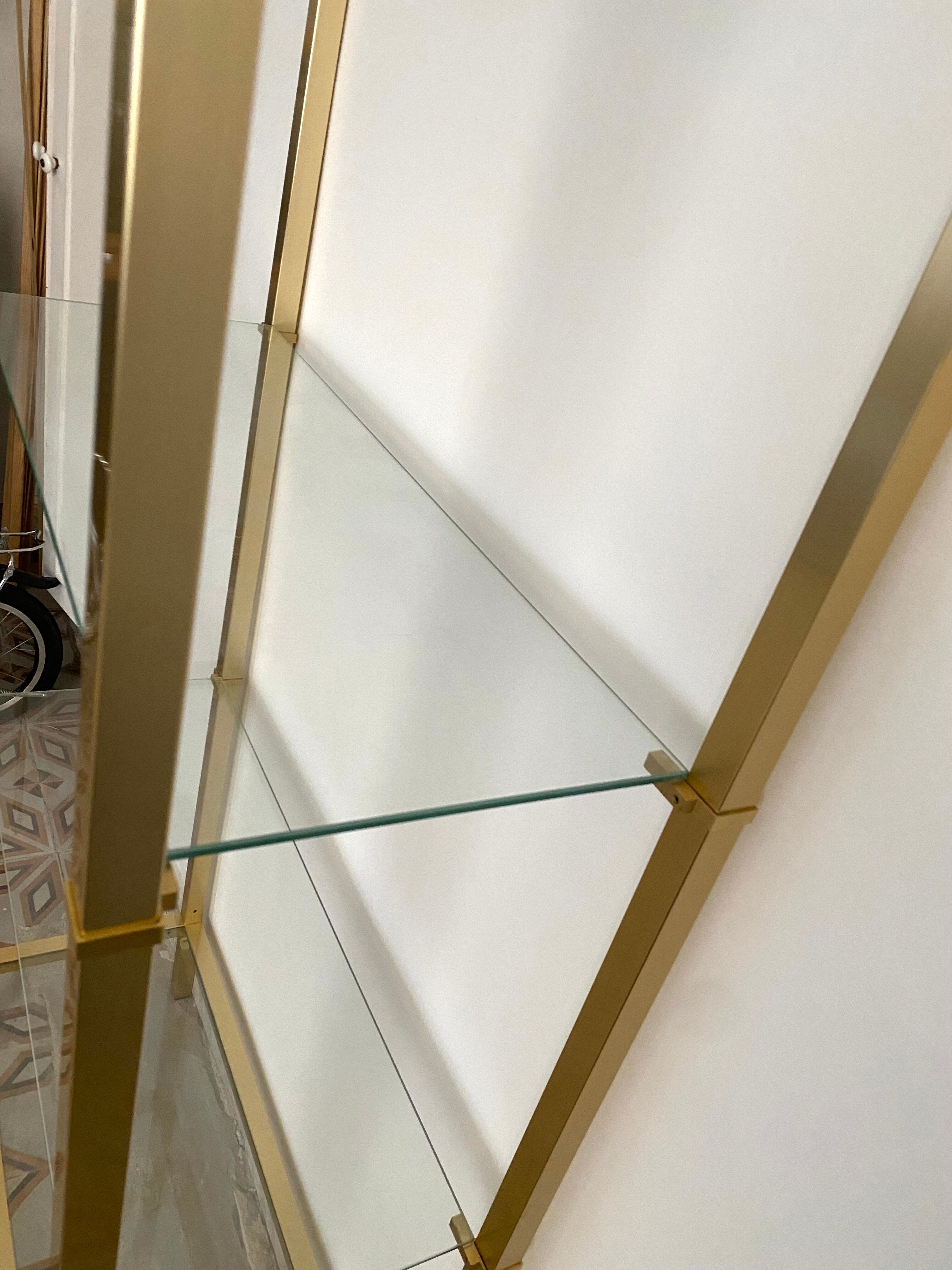 Bookcase in gilded metal and glass, Pierre Vandel Paris, circa 70