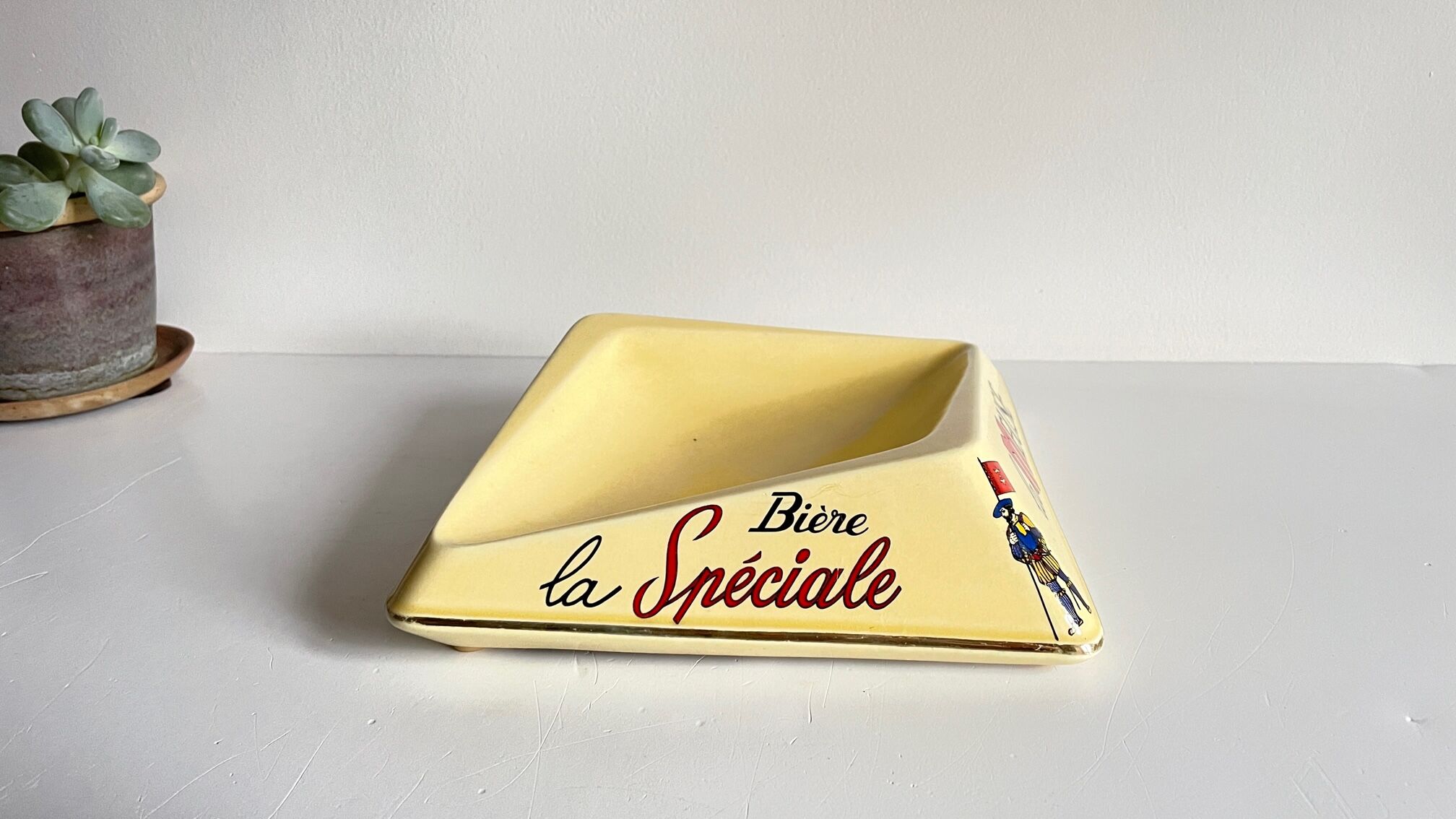 Vintage ceramic bistro ashtray