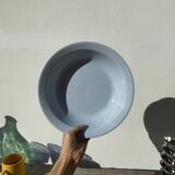 Round, flat, sky-blue ceramic salad bowl from Moulin des Loups